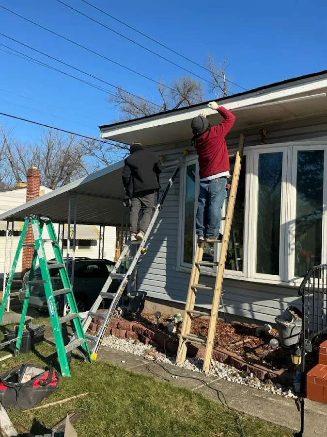 Restoration crew performing exterior repair in Highwood